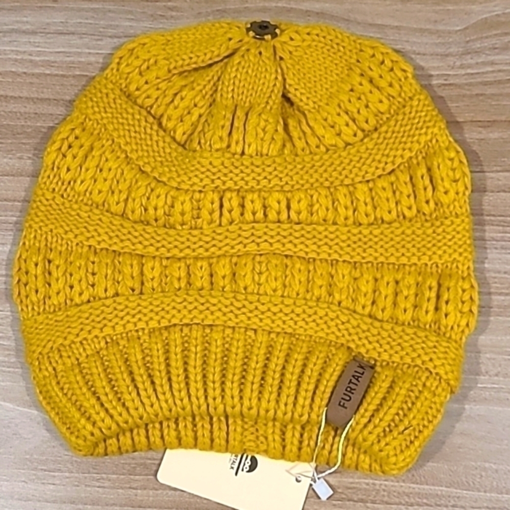 FURTALK yellow knitted beanie with removable top furball that snaps on/off.